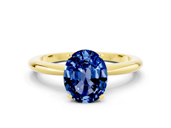 Yellow gold Oval Cut Blue Sapphire Solitaire Ring with Six-Prong Setting and Classic Band
