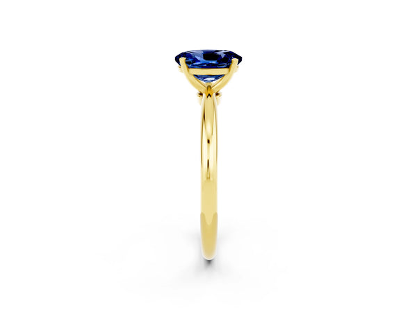 Yellow gold Oval Cut Blue Sapphire Solitaire Ring with Six-Prong Setting and Classic Band
