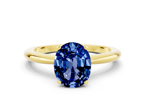 Yellow gold Oval Cut Blue Sapphire Solitaire Ring with Six-Prong Setting and Classic Band