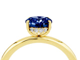 Yellow gold Oval Cut Blue Sapphire Solitaire Ring with Thin Band and Four-Prong Setting_16