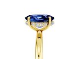 Yellow gold Oval Cut Blue Sapphire Solitaire Ring with Thin Band and Four-Prong Setting_17