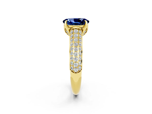 Yellow gold Oval Cut Blue Sapphire Solitaire Ring with Three-Row Pavé Band and Four-Prong Setting