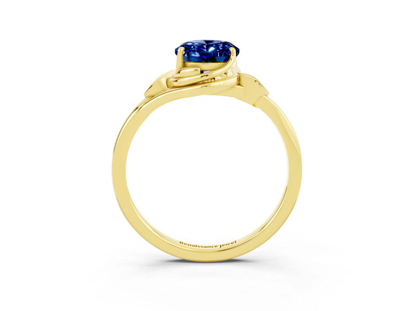 Yellow gold Oval Cut Blue Sapphire Solitaire Ring with Twist Band and Four-Prong Setting