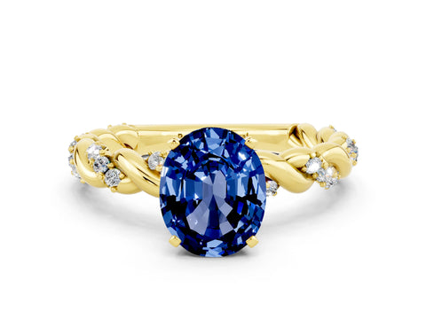 Yellow gold Oval Cut Blue Sapphire Solitaire Ring with Twisted Band and Pavé Accents