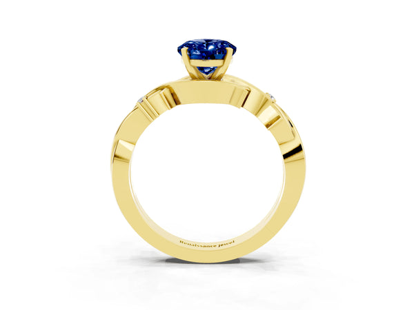 Yellow gold Oval Cut Blue Sapphire Solitaire Ring with Twisted Band and Prong Setting