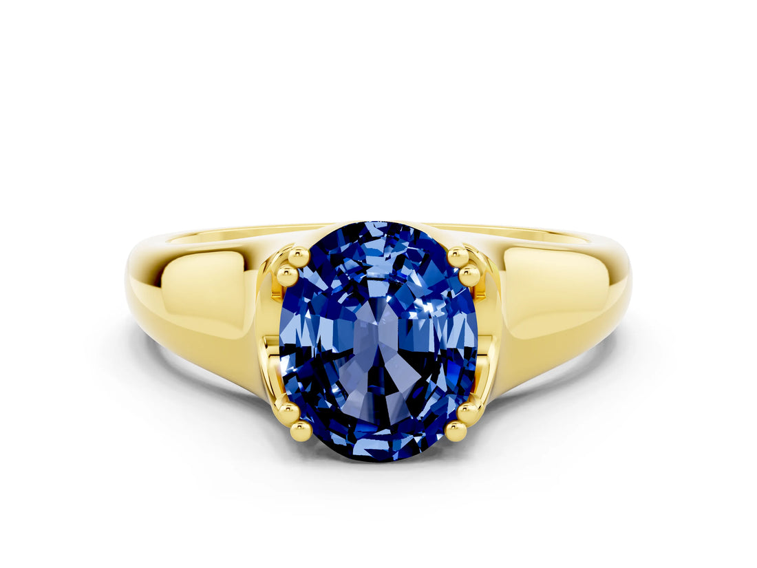 Yellow gold Oval Cut Blue Sapphire Solitaire Ring with Wide Band and Prong Setting