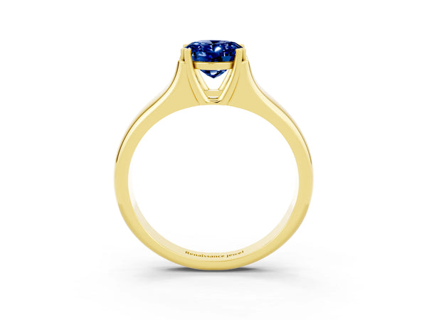 Yellow gold Oval Cut Blue Sapphire Solitaire Ring with Wide Band and Prong Setting
