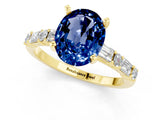 Yellow gold Oval Cut Blue Sapphire Solitaire with Side Baguettes and Channel Set Band_1