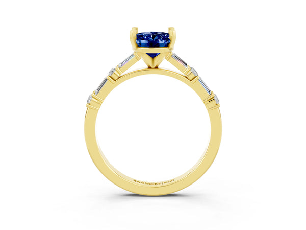 Yellow gold Oval Cut Blue Sapphire Solitaire with Side Baguettes and Channel Set Band