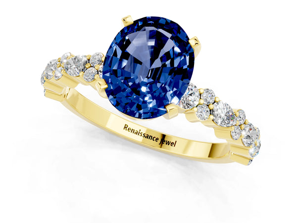 Yellow gold Oval Cut Blue Sapphire Side Stone Solitaire Ring with Round  and Four-Prong Setting