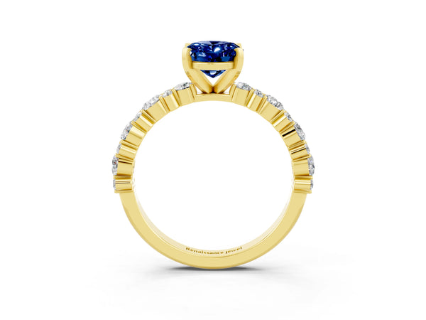 Yellow gold Oval Cut Blue Sapphire Side Stone Solitaire Ring with Round  and Four-Prong Setting