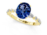 Yellow gold Oval Cut Blue Sapphire Solitaire with Side Stones on a Pavé Band and Four-Prong Setting_1