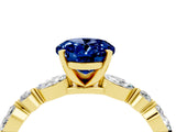 Yellow gold Oval Cut Blue Sapphire Solitaire with Side Stones on a Pavé Band and Four-Prong Setting_4