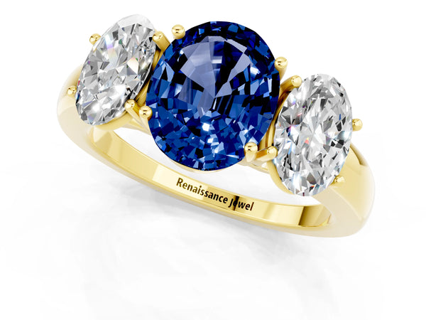 Yellow gold Oval Cut Blue Sapphire Three-Stone Ring with Four-Prong Setting and Classic Band