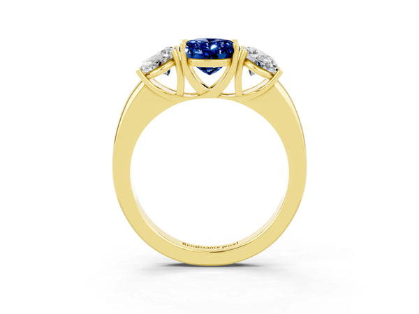 Yellow gold Oval Cut Blue Sapphire Three-Stone Ring with Four-Prong Setting and Classic Band