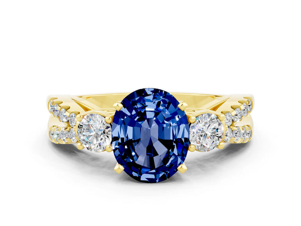 Yellow gold Oval Cut Blue Sapphire Three-Stone Ring with Pavé Split Shank and Four-Prong Setting