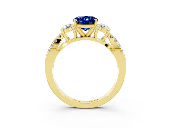 Yellow gold Oval Cut Blue Sapphire Three-Stone Ring with Pavé Split Shank and Four-Prong Setting