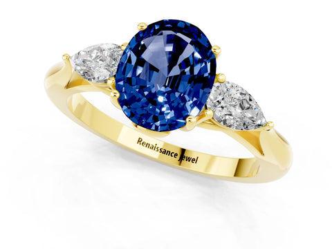 Yellow gold Oval Cut Blue Sapphire Three-Stone Ring with Pear Side Stones and Four-Prong Setting_13