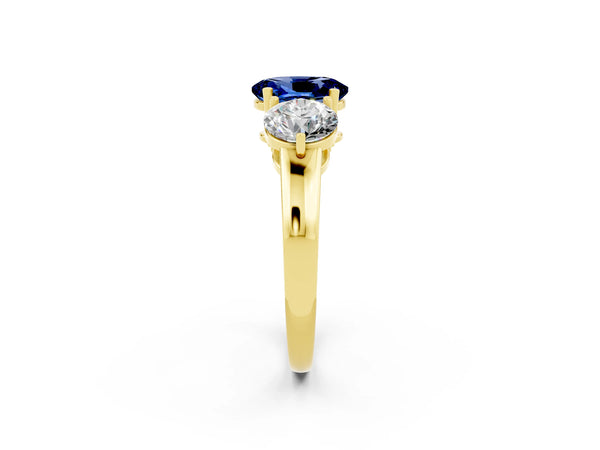 Yellow gold Oval Cut Blue Sapphire Three-Stone Ring with Prong Setting and Classic Band
