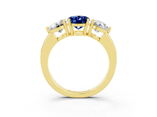 Yellow gold Oval Cut Blue Sapphire Three-Stone Ring with Prong Setting and Classic Band