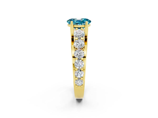 Yellow gold Oval Cut Blue Topaz Engagement Ring with Pavé Band and Four-Prong Setting