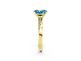 Yellow gold Oval Cut Blue Topaz Engagement Ring with Side Stone Accents and Four-Prong Setting_29