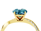 Yellow gold Oval Cut Blue Topaz Engagement Ring with Side Stone Accents and Four-Prong Setting_64