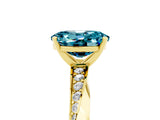 Yellow gold Oval Cut Blue Topaz Engagement Ring with Side Stone Accents and Four-Prong Setting_65