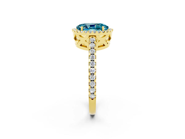 Yellow gold Oval Cut Blue Topaz Halo Engagement Ring with Pavé Band and Prong Setting