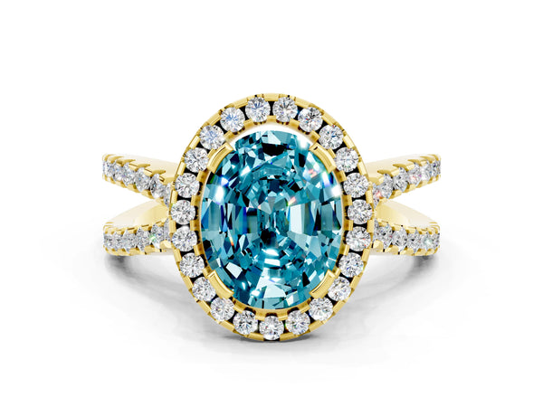 Yellow gold Oval Cut Blue Topaz Halo Ring with Split Shank Pavé Band and Prong Setting