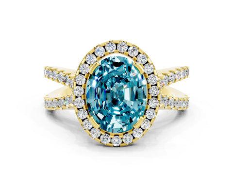 Yellow gold Oval Cut Blue Topaz Halo Ring with Split Shank Pavé Band and Prong Setting