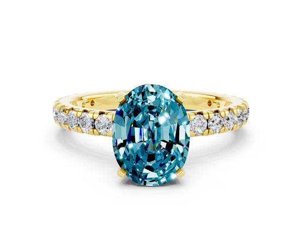 Yellow gold Oval Cut Blue Topaz Pavé Solitaire Ring with Round Band and Prong Setting
