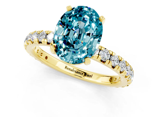 Yellow gold Oval Cut Blue Topaz Pavé Solitaire Ring with Round Band and Prong Setting