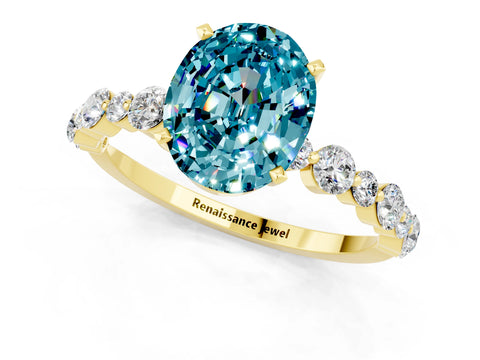 Yellow gold Oval Cut Blue Topaz Prong Set Engagement Ring with Pavé Band_1