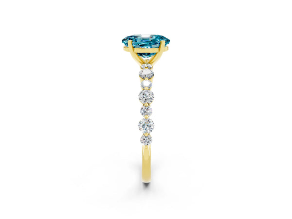 Yellow gold Oval Cut Blue Topaz Prong Set Engagement Ring with Pavé Band