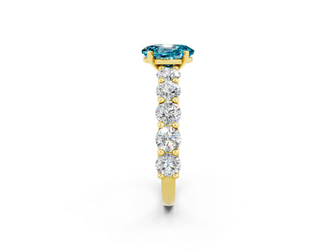 Yellow gold Oval Cut Blue Topaz Prong Setting with Side Stones on a Pave Band_2