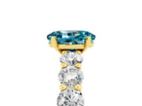 Yellow gold Oval Cut Blue Topaz Prong Setting with Side Stones on a Pave Band_5