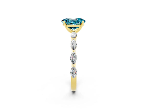 Yellow gold Oval Cut Blue Topaz Ring with Marquise Side Stones and Prong Setting