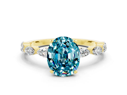 Yellow gold Oval Cut Blue Topaz Ring with Marquise Side Stones and Prong Setting