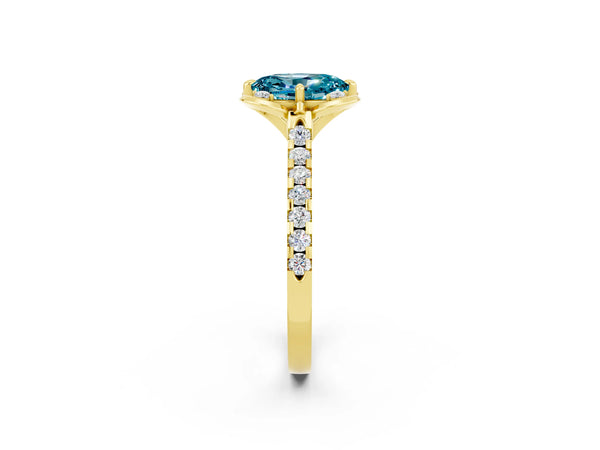 Yellow gold Oval Cut Blue Topaz Ring with Pavé Band and Floral Prong Setting