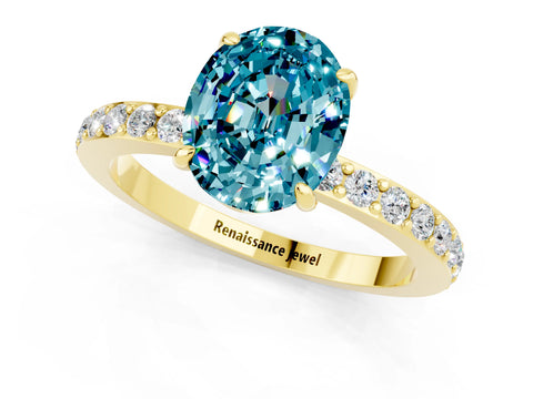 Yellow gold Oval Cut Blue Topaz Ring with Pavé Band and Four-Prong Setting_1