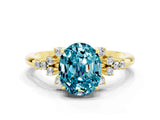 Yellow gold Oval Cut Blue Topaz Ring with Side Stones and Four-Prong Setting_72