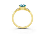 Yellow gold Oval Cut Blue Topaz Ring with Side Stones and Four-Prong Setting_75