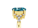 Yellow gold Oval Cut Blue Topaz Ring with Side Stones and Four-Prong Setting_77