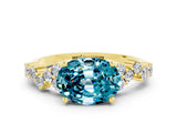 Yellow gold Oval Cut Blue Topaz Scattered Round Accent Ring with Prong Setting_12