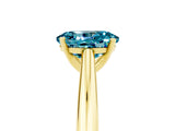 Yellow gold Oval Cut Blue Topaz Solitaire Engagement Ring with Cathedral Setting and Four-Prong Mount_23