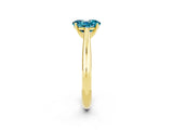 Yellow gold Oval Cut Blue Topaz Solitaire Engagement Ring with Cathedral Setting and Four-Prong Mount_26