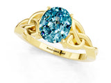 Yellow gold Oval Cut Blue Topaz Solitaire Engagement Ring with Celtic Knot Band and Four-Prong Setting_1