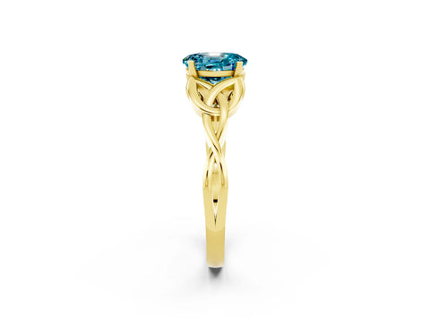 Yellow gold Oval Cut Blue Topaz Solitaire Engagement Ring with Celtic Knot Band and Four-Prong Setting_2