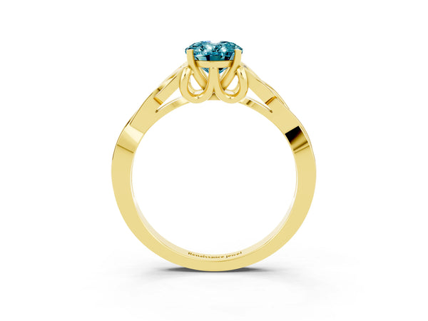 Yellow gold Oval Cut Blue Topaz Solitaire Engagement Ring with Celtic Knot Band and Four-Prong Setting